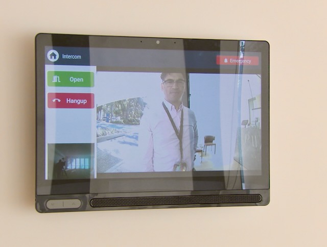 CareHub showing live video intercom feed with door controls