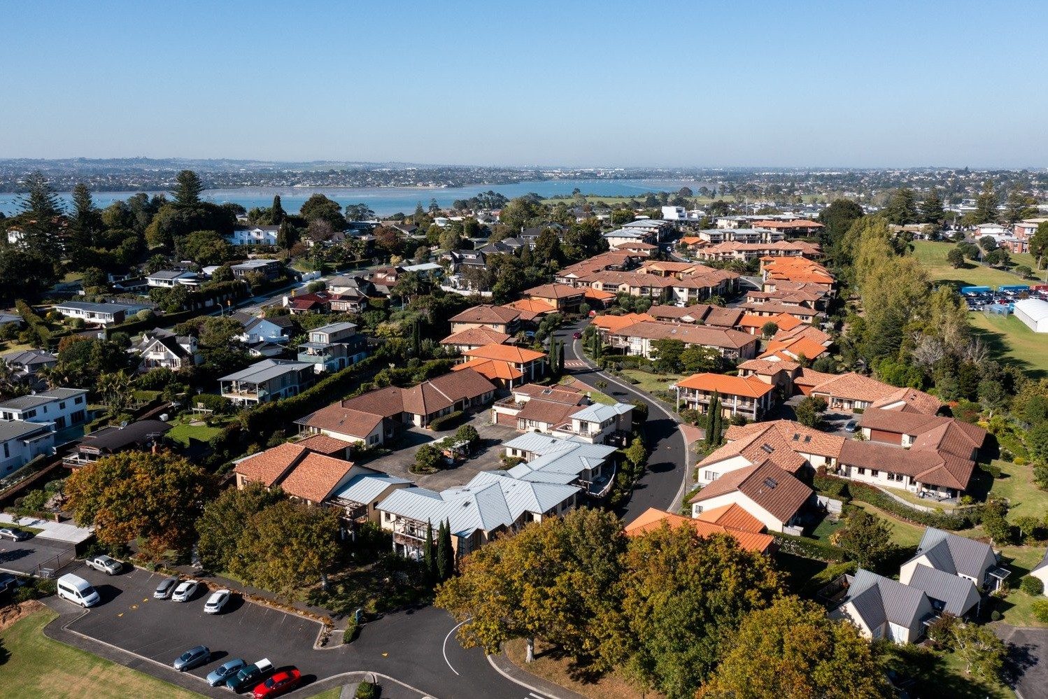 St Andrew's Village - aerial view of established community by the harbour